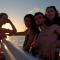 Golden hour group photo on the mini cruise
