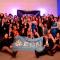 ESN Italy's delegation group posing with the flag at the gala dinner